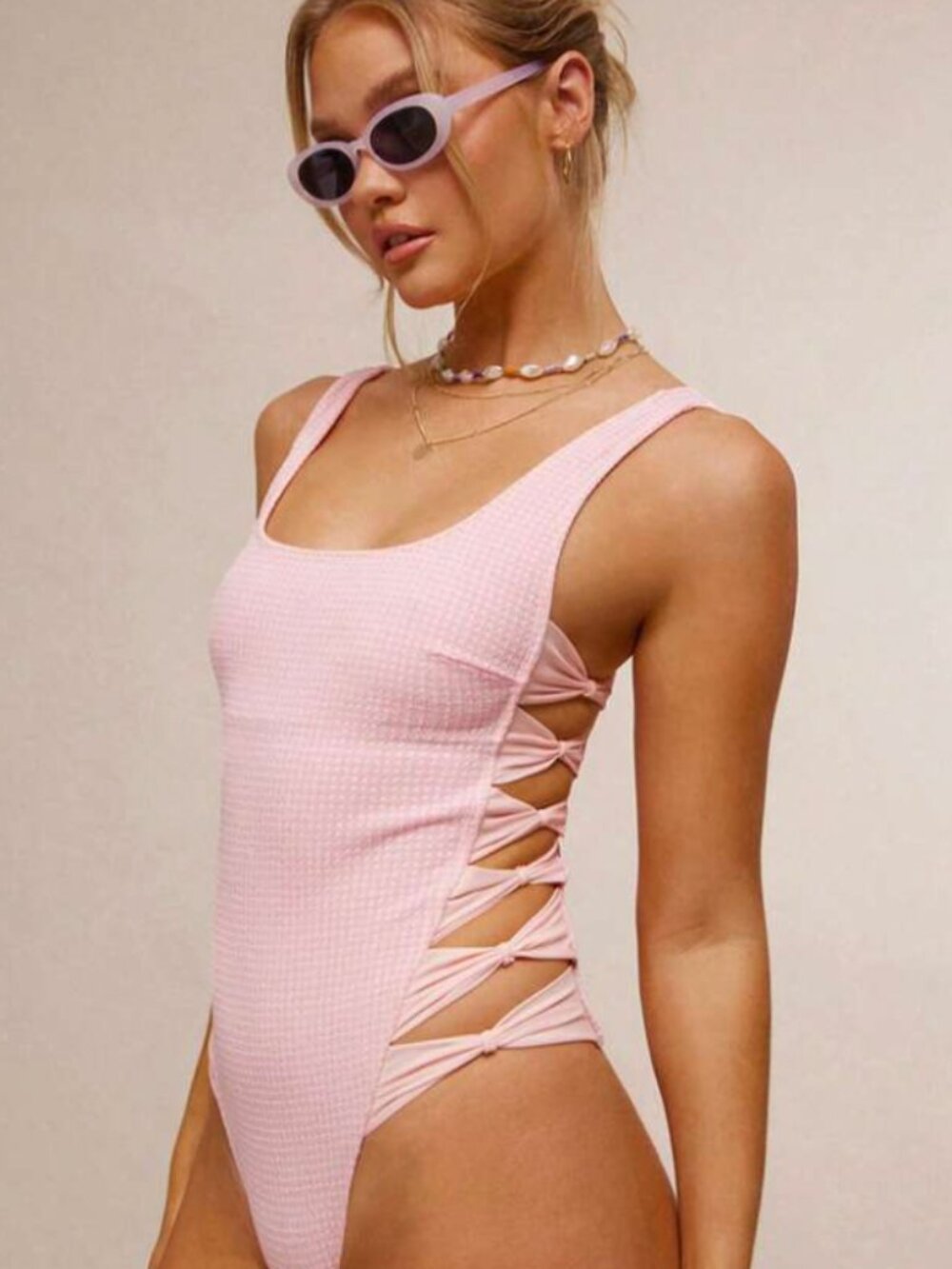 Pink one piece with side bows